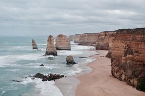 cloudy sky over the rocks twelve apostles in australia