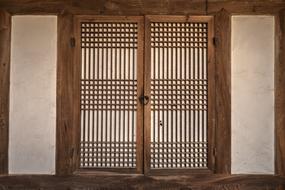 wooden shutters on the windows of a building in the Republic of Korea