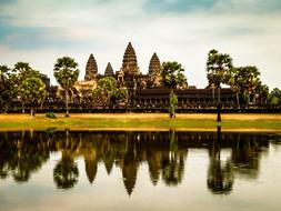 Ruins of angkor wat Temple mirroring on water, Cambodia