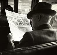 Man Newspaper and Hat