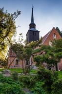 small Church with Tower at summer evening