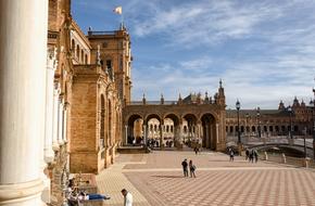 people in the square in seville