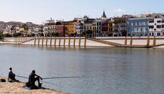 Seville River person fishing