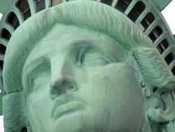 Face of the green statue of Liberty in USA