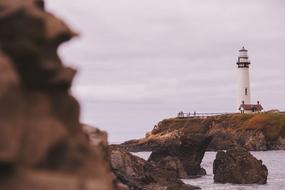 Lighthouse Sea on bif stone