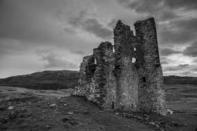 monochrome photo of the ruins of a castle in Scotland