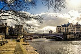 embankment and bridge in sunny day, UK