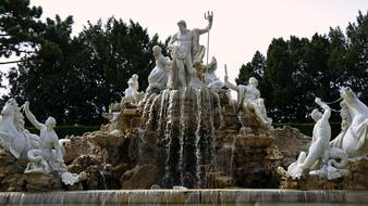 landscape of famous fountain in the park of Schonbrunn Palace in Vienna