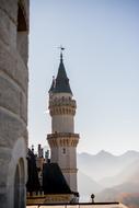 tower with a spire in the architecture of the old city