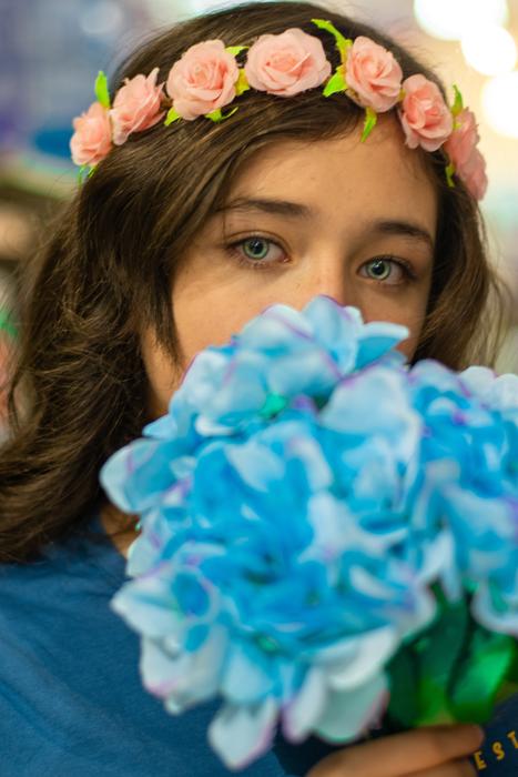 young model with blue flowers