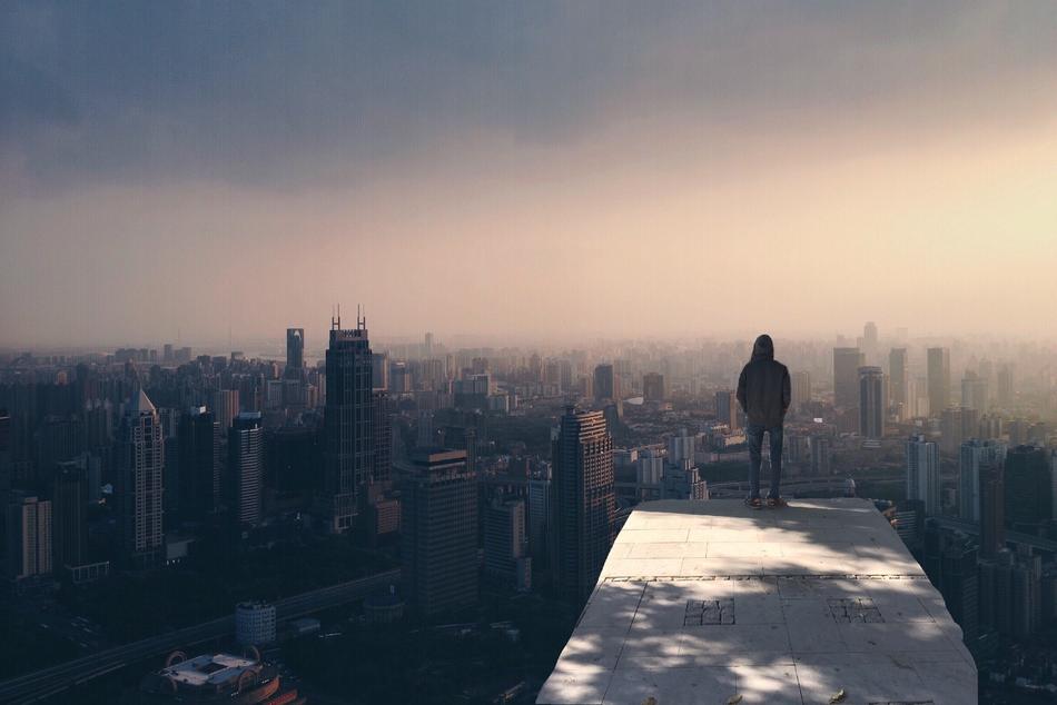 guy over cityscape