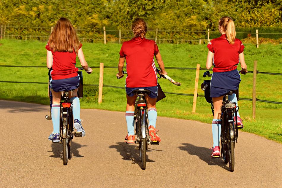 cycling girls on a field