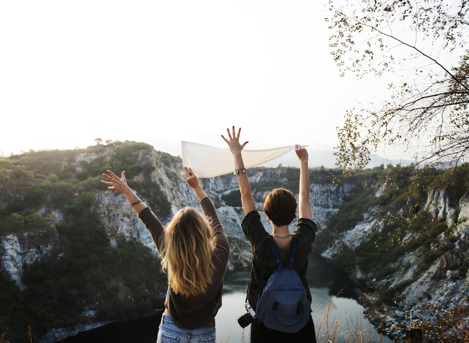 young carefree people in the mountains