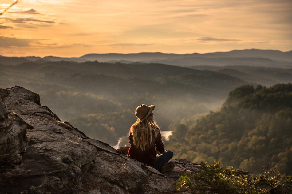 girl in the mountains at sunset