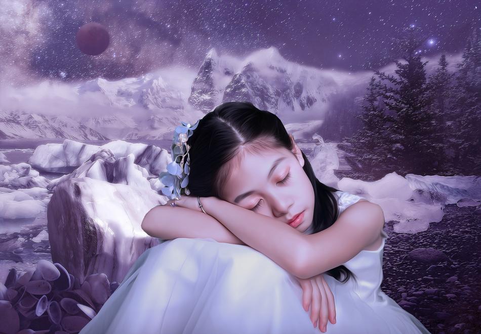 photo of a sleeping girl on the background of the universe