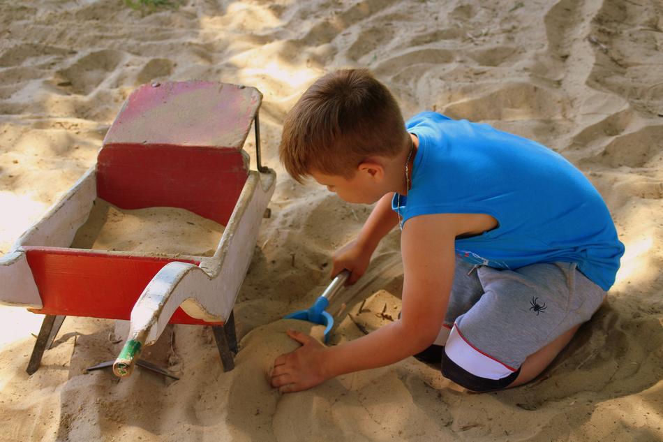 Boy play sand