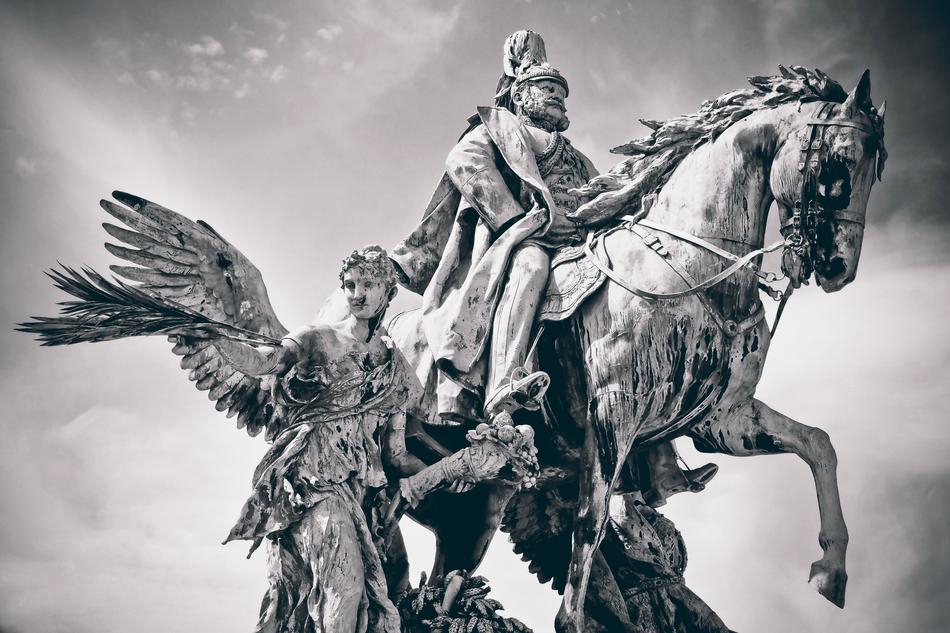 emperor on horseback as a sculpture in black and white background