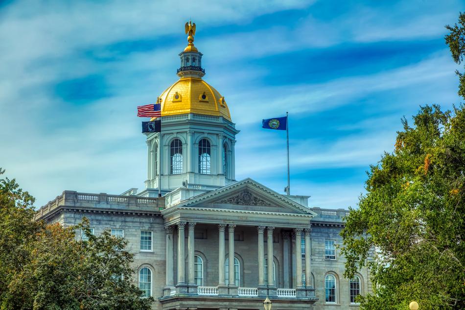Beautiful State Capitol, among the colorful plants in Concord, New Hampshire, America
