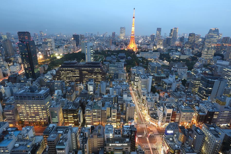 evening photo of modern Paris and the Eiffel Tower from a bird's eye view