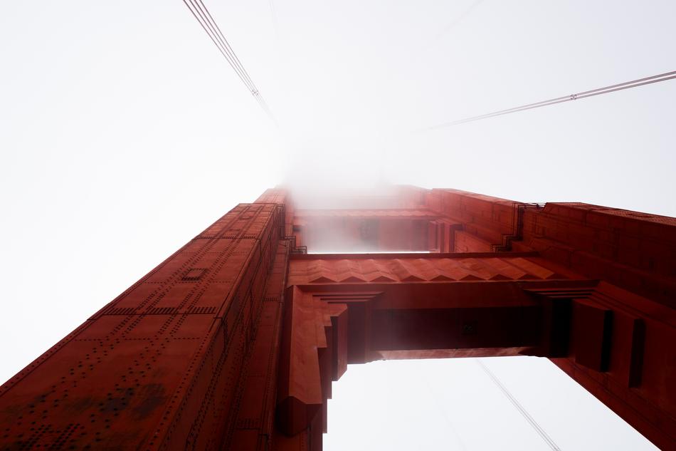 bottom view of the red bridge in the fog