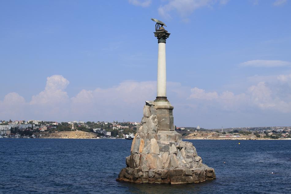 Beautiful monument, among the sea with blue water in Sevastopol, Crimea