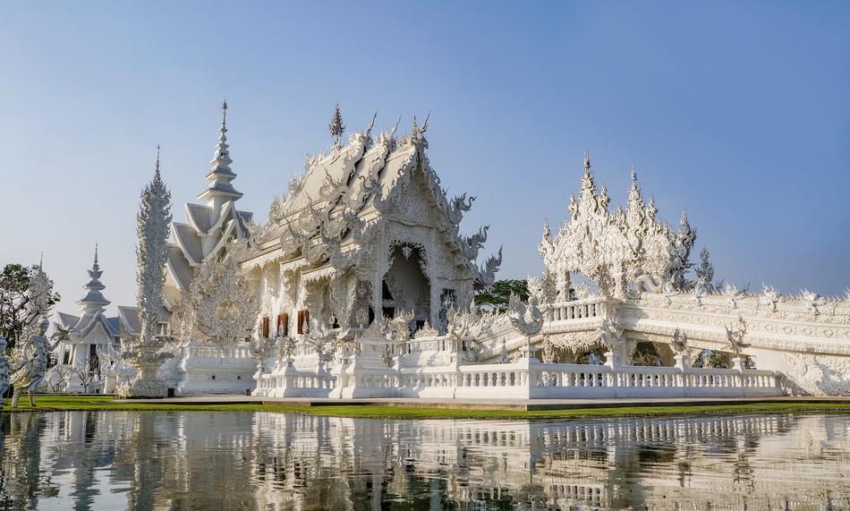 wonderful white Temple among the water in Thailand