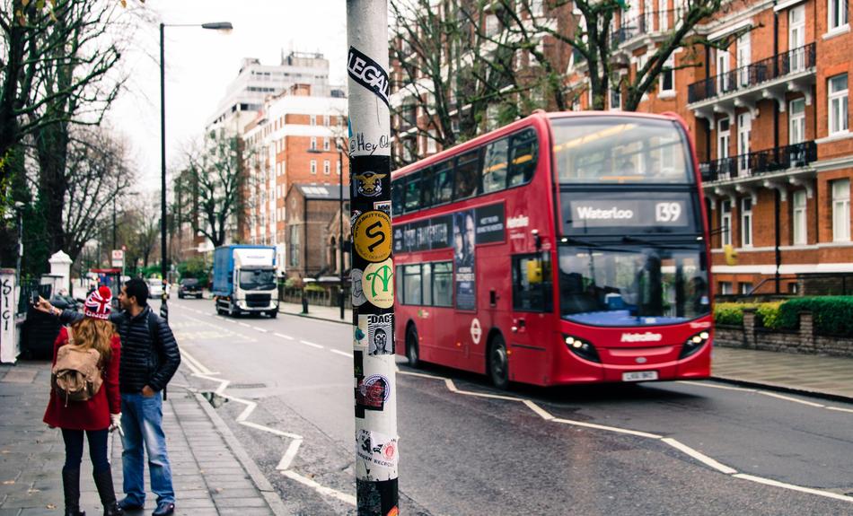 red bus on london city street