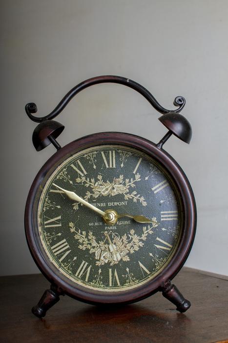 Antique alarm Clock with floral ornament