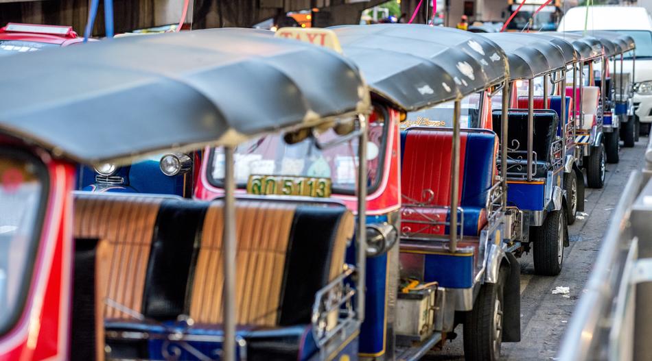 Colorful Tuk Tuk vehicles on the street of Bangkok in Thailand
