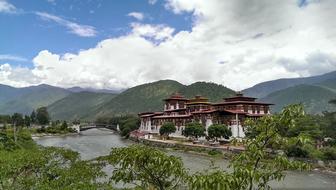 Beautiful Punakha Dzong among the colorful plants in Punakha, Butan
