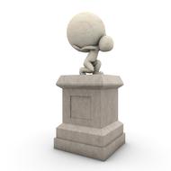 figurine with a ball as a symbol of strength