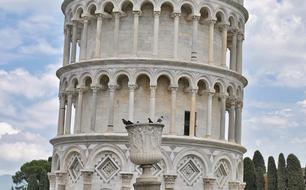 Beautiful and decorated Pisa tower with columns in Italy