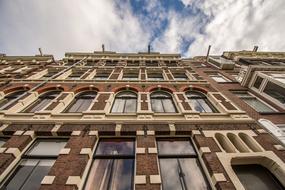 brown building facade in Amsterdam