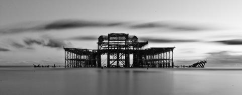 Pier over calm sea, black and white, uk, england, Brighton