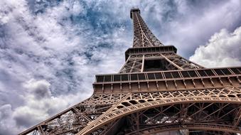 Eiffel Tower and cloudy sky