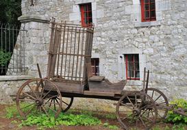 wooden prisoner cage on cart