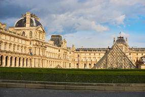 green lawn in front of the louvre