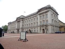 pink pavement on the square in front of the palace in london