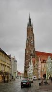 church with clock tower in old european city