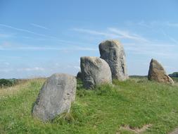 big stones on green grass