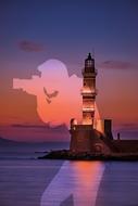 Photographer and lighthouse at sunset