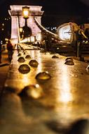 Beautiful, shiny chain bridge above the Danube River, in light, in Budapest, Hungary, at night