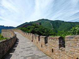 famous Great Wall Of China and green forest