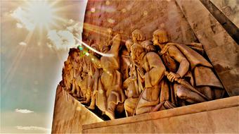 Beautiful Monument of Discoverers, in the colorful sunlight, in Lisbon, Portugal