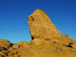 Beautiful Sphinx, at blue sky on background, in Romania