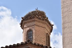 tower on a historic building against the sky