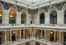 Beautiful and colorful Hofburg Palace, with the lights and columns, in Vienna, Austria
