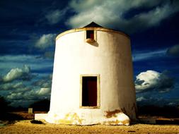 evening clouds over the ancient mill