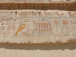 Beautiful and colorful paintings and hieroglyphics on the Hatshepsut Temple, in Egypt