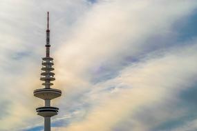 Top of the tv tower of Hamburg, at beautiful and colorful sky with clouds, in Hamburg, Germany